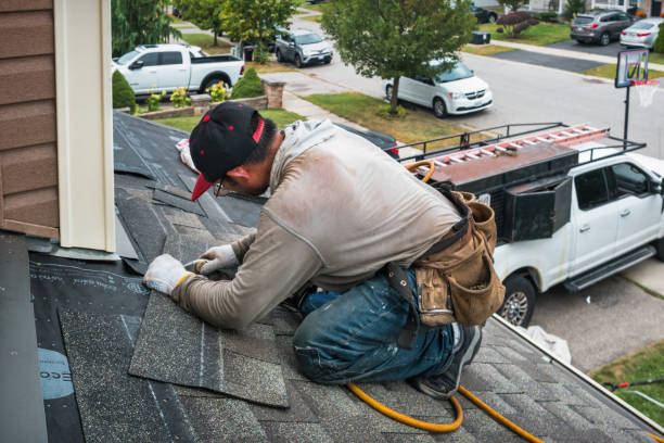 Professional Roofing technician working in Hallsboro, NC